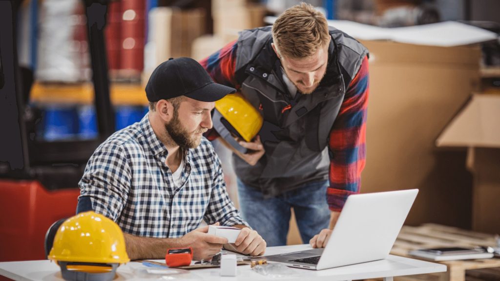 Technicians are analyzing an asset dashboard showing structured MRO master data, demonstrating how accurate data supports maintenance planning, predictive maintenance, and operational efficiency.